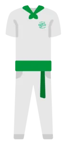 Traje de peñista de la Casa de Andalucía. Pañuelo verde, camiseta blanca, fajín verde y pantalón blanco.